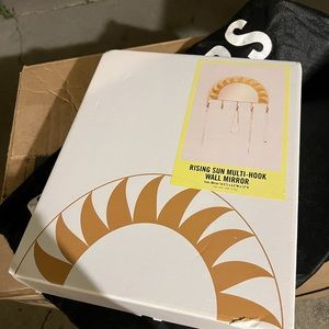 New Urban outfitters rising Sun multi-hook wall mirror.